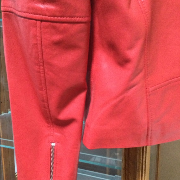 Burnt Red Leather jacket with zip sleeves and double zipper pockets. - Picture 4 of 5